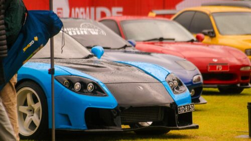 Modified Mazda RX-7 Supercars on Display at Car Show Desktop Wallpaper