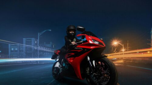 Woman Rider on Red Honda CBR Sportbike at Night 4K Desktop Wallpaper