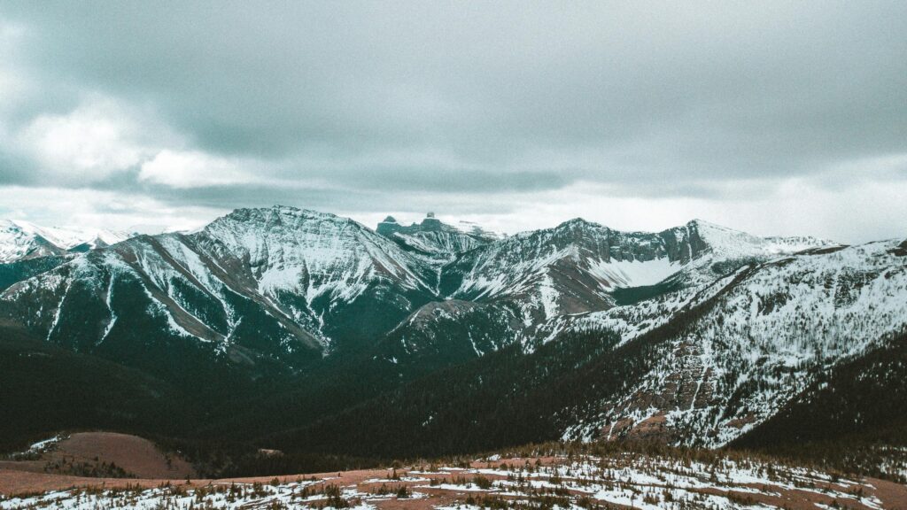 Dramatic Snowy Peaks and Alpine Mountain Landscape 4K Wallpaper