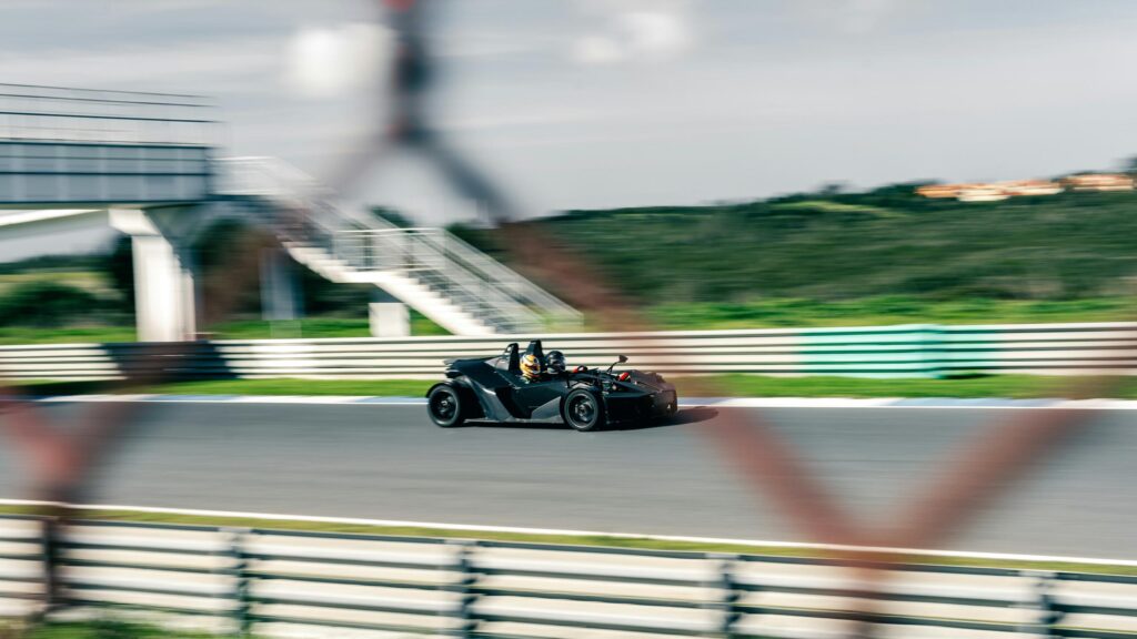 KTM X-Bow Sports Car Racing on Track Desktop Wallpaper