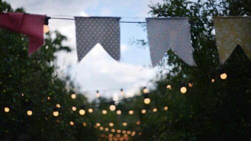 Garden Party String Lights and Bunting Flags 4K Desktop Wallpaper