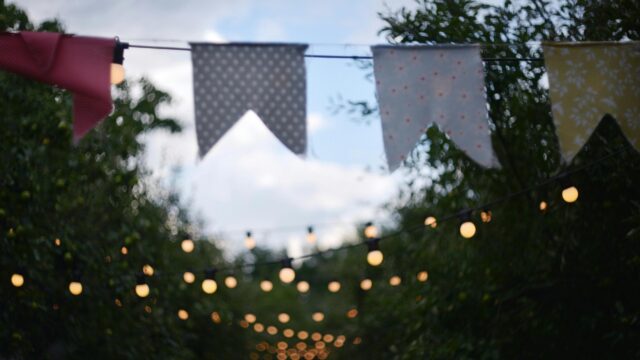 Garden Party String Lights and Bunting Flags 4K Desktop Wallpaper