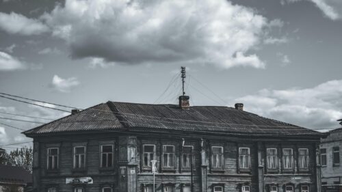 Antique Wooden House with Ornate Details 4K Desktop Wallpaper