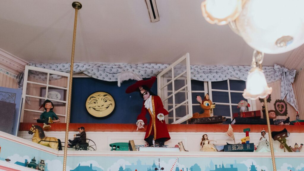 Whimsical Disney Character Display Shelf 4K Desktop Wallpaper