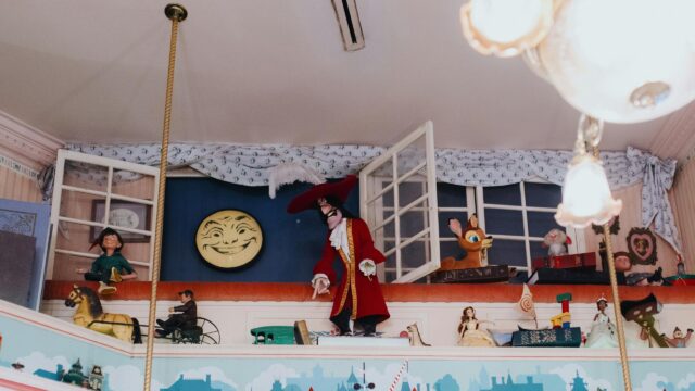 Whimsical Disney Character Display Shelf 4K Desktop Wallpaper