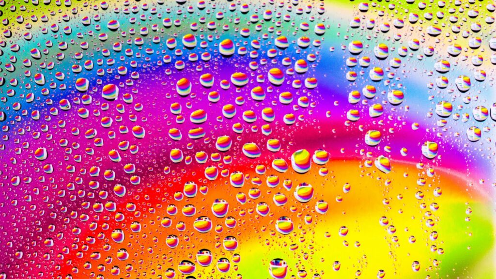 Vibrant Rainbow Water Droplets Abstract 4K Desktop Wallpaper