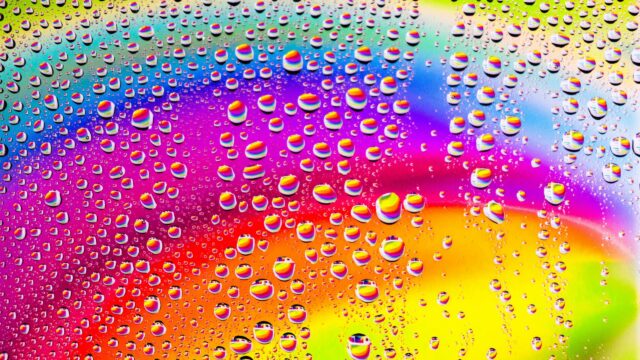 Vibrant Rainbow Water Droplets Abstract 4K Desktop Wallpaper