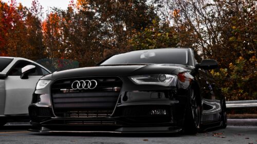 Stanced Black Audi A4 Sedan Front View Autumn Background 4K Wallpaper