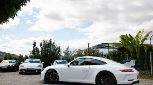 White Porsche 911 GT3 and Luxury Car Meetup 4K Desktop Wallpaper