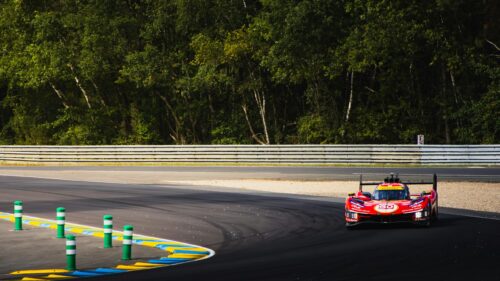 Ferrari 499P Le Mans Hypercar Racing on Track 4K Wallpaper
