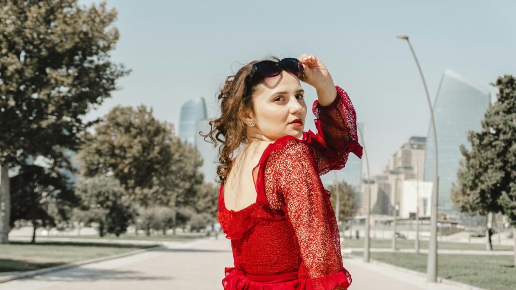 Elegant Woman in Red Lace Dress Outdoors Desktop Wallpaper