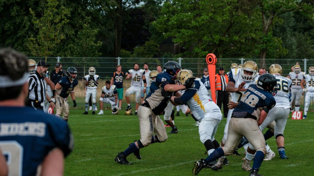Intense American Football Line Scrimmage 4K Wallpaper