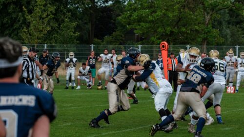 Intense American Football Line Scrimmage 4K Wallpaper