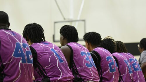 Basketball Team Bench Players in Pink Lightning Jerseys Desktop Wallpaper