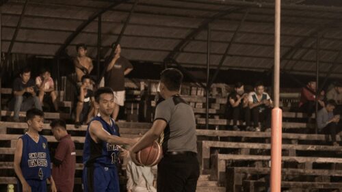 Basketball Referee Handing Ball to Player High Resolution Desktop Wallpaper