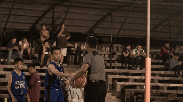 Basketball Referee Handing Ball to Player High Resolution Desktop Wallpaper