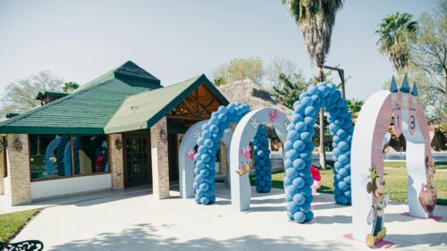 Enchanting Minnie Mouse Party Archway at Outdoor Venue Desktop Wallpaper
