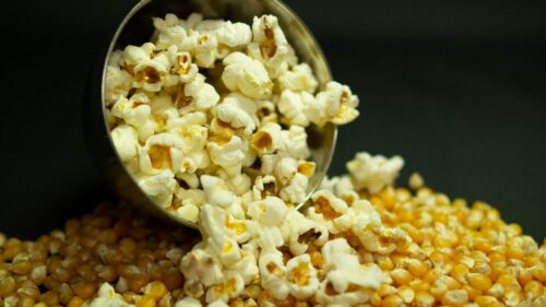 Popcorn Bowl and Unpopped Corn Kernels 4K Desktop Wallpaper
