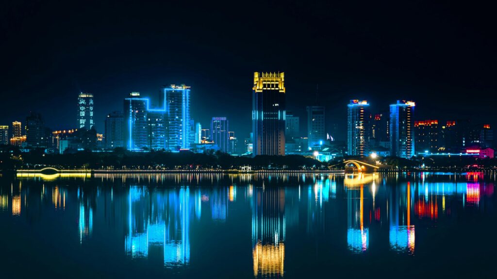Neon Blue City Skyline Reflection Night Scenery 4K Desktop Wallpaper