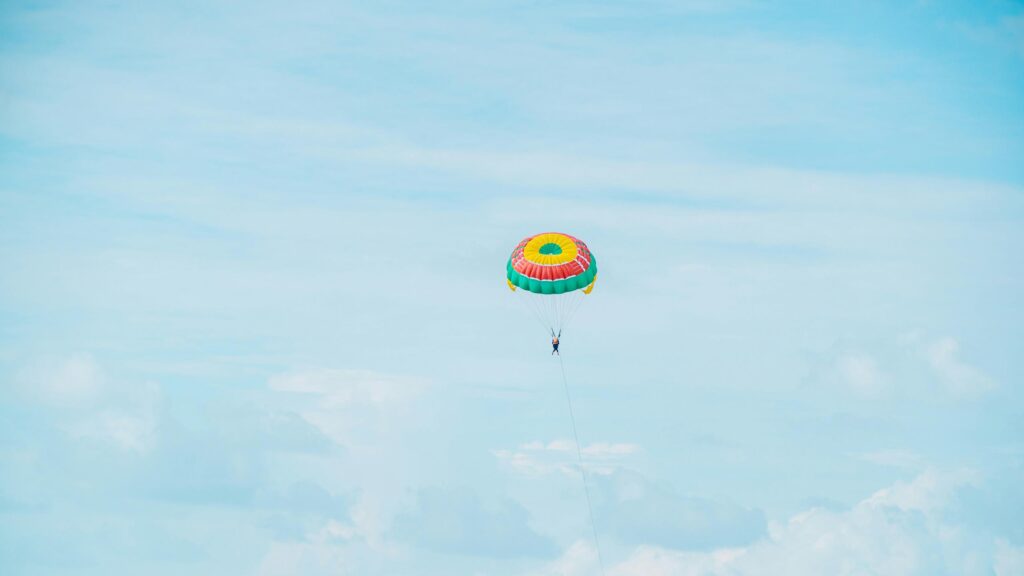 Parasailing Adventure Over Tropical Skies 4K Desktop Wallpaper
