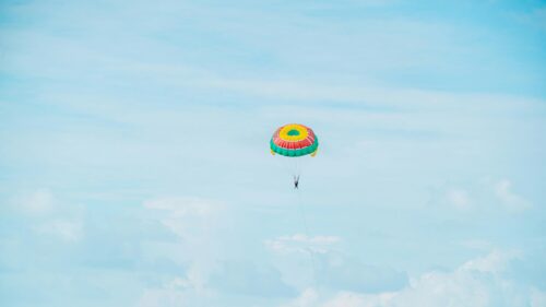 Parasailing Adventure Over Tropical Skies 4K Desktop Wallpaper
