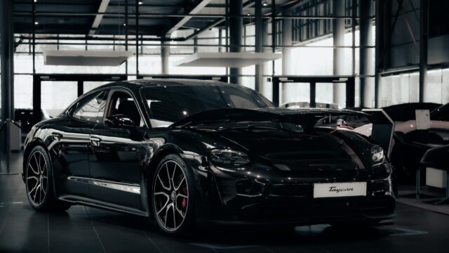 Sleek Black Porsche Taycan Luxury Electric Sports Car 4K Wallpaper