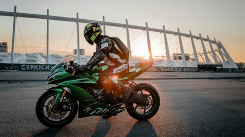 Stunning Kawasaki Ninja Sportbike Sunset Ride 4K Wallpaper
