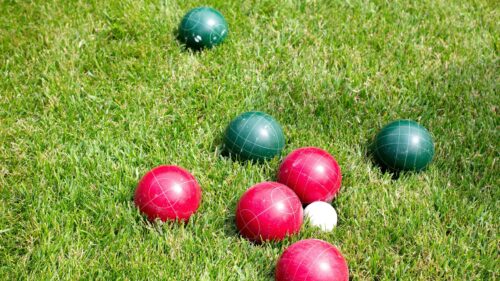 Bocce Ball Game on Green Grass 4K Wallpaper