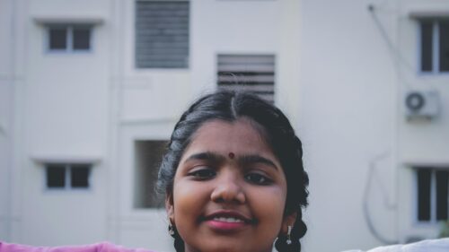 Smiling Indian Girl with Braided Hair Portrait Desktop Wallpaper