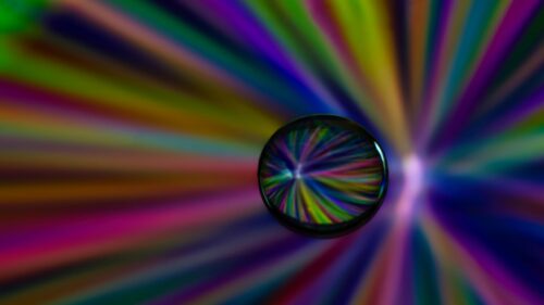 Abstract Prism Glass Sphere with Radiant Colorful Light Rays 4K Wallpaper