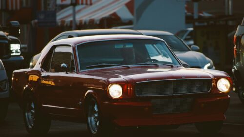 Classic Vintage Red Ford Mustang Coupe at Sunset Desktop Wallpaper