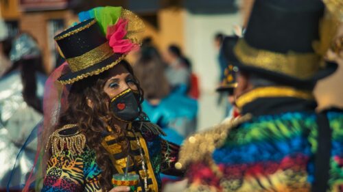 Colorful Carnival Performers in Vibrant Festive Costumes 4K Wallpaper