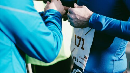 Runner Preparing for 10K Race Closeup 4K Desktop Wallpaper