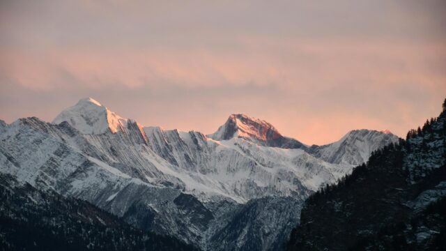 Stunning Pink Sunset Over Majestic Snow Capped Mountain Peaks Desktop Wallpaper