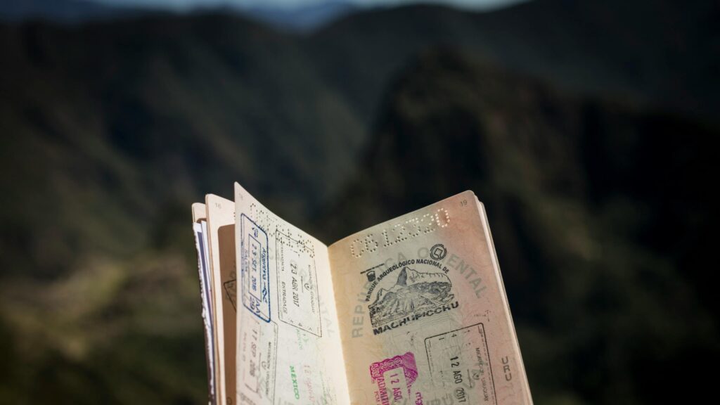 Open Passport with Machu Picchu Souvenir Stamp Desktop Wallpaper