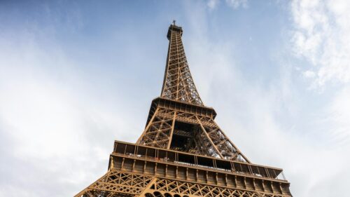Stunning Low-Angle View of the Eiffel Tower in Paris 4K Wallpaper