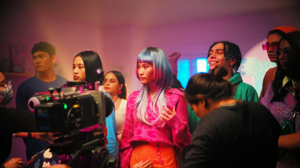 Behind the Scenes Film Production Crew and Colorful Cosplay Fashion Desktop Wallpaper