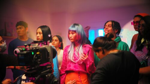 Behind the Scenes Film Production Crew and Colorful Cosplay Fashion Desktop Wallpaper