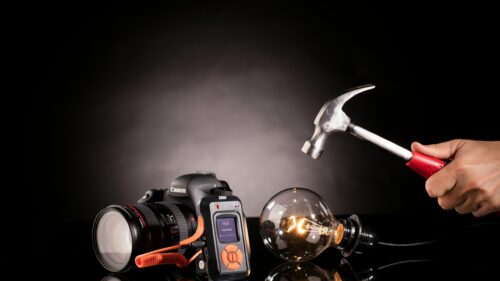 Creative Photography Concept with Camera and Lightbulb 4K Wallpaper
