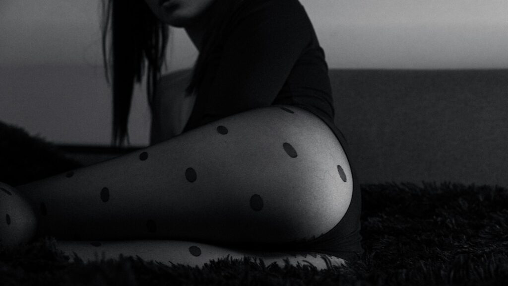 Sensual Woman in Polka Dot Tights Black and White Aesthetic Desktop Wallpaper