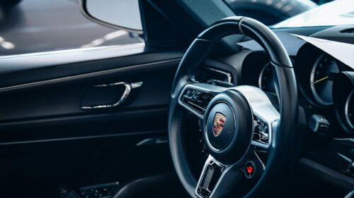 Luxury Porsche Steering Wheel Interior Close Up 4K Wallpaper