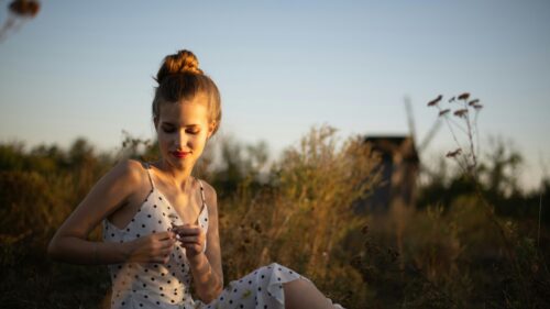 Beautiful Woman in Polka Dot Dress at Golden Hour Desktop Wallpaper