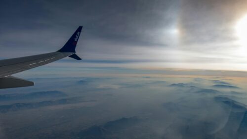 Flydubai Wing Over Hazy Mountain Landscapes Desktop Wallpaper