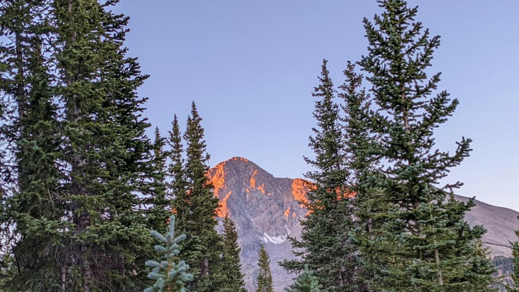 Golden Sunrise Over Majestic Mountain Peak Desktop Wallpaper