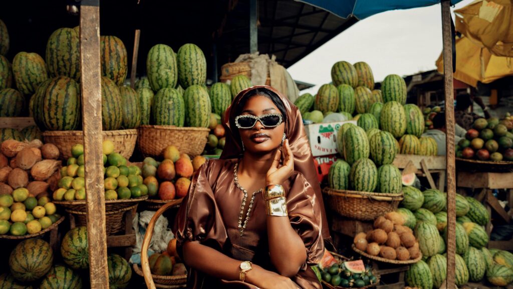 Stunning Fashion Portrait in a Tropical Fruit Market 4K Wallpaper