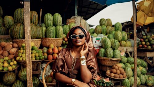 Stunning Fashion Portrait in a Tropical Fruit Market 4K Wallpaper