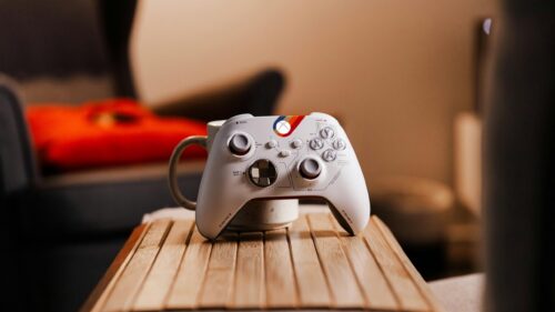 Starfield Limited Edition Xbox Controller on Wooden Desk 4K Wallpaper