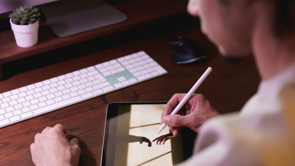 Creative Digital Artist Working on Tablet 4K Desktop Wallpaper