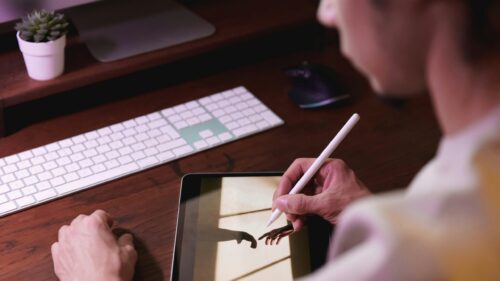 Creative Digital Artist Working on Tablet 4K Desktop Wallpaper