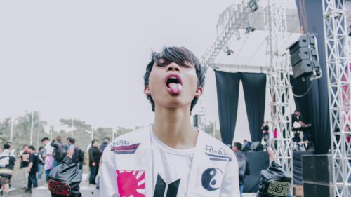 Anime Inspired Aesthetic Guy Sticking Tongue Out PC Wallpaper